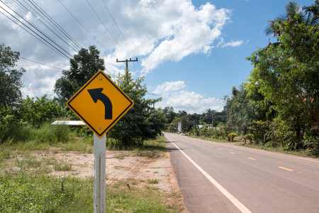 Road Signs warn Drivers for Ahead Dangerous Curve.の写真素材
