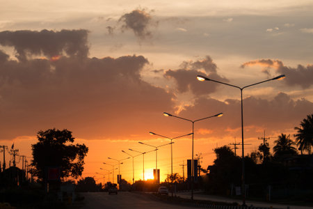 Light on load and golden light with Silhouette environment, High level of noise. sun rise or sun set time.の写真素材