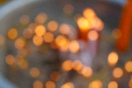 Defocused city night filtered bokeh abstract background.の写真素材