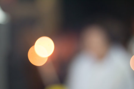 Defocused city night filtered bokeh abstract background.の写真素材