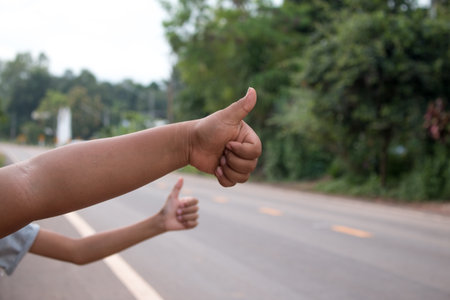 Closeup of Hand sign call a car.の写真素材