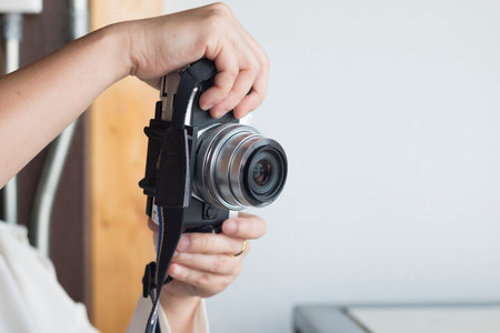 A Woman use digital camera take photo.の写真素材