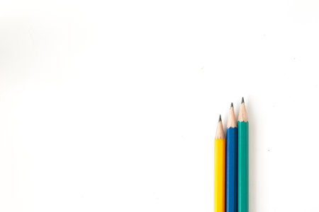 Tree pencils multi-colour on white background for useful like concept business, education and art background.の写真素材