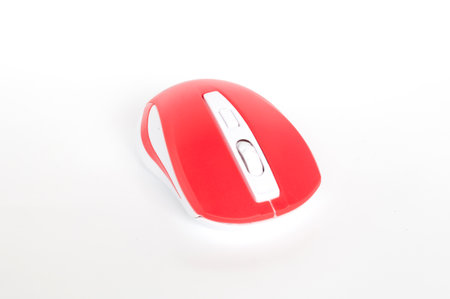 Red color of computer mouse on white background.の写真素材