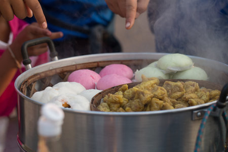 Steamed BBQ Pork Asian Buns or Chinese food's  steamed bun with Dim Sum in steamer pot.の写真素材
