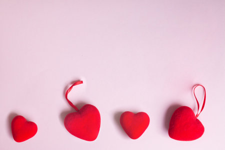 Valentines day concept, red decorate heart on sweet pink background design for greeting card.の写真素材