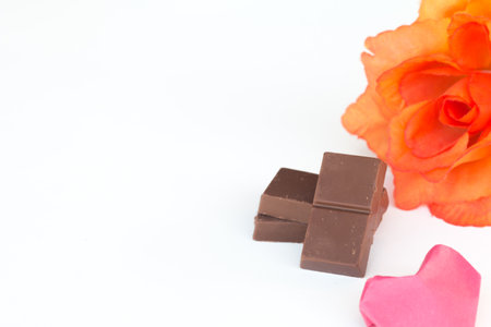 Chopped chocolate bars on white background.の写真素材