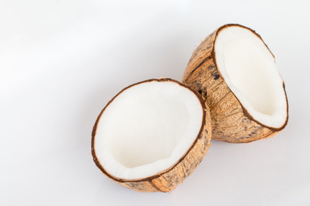 Close up of coconut on white background.の写真素材