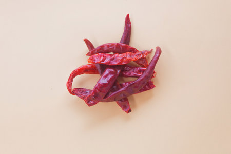 Dried red chili or chilli cayenne peppers on vintage background tone, , Food objects on pastel color background.の写真素材
