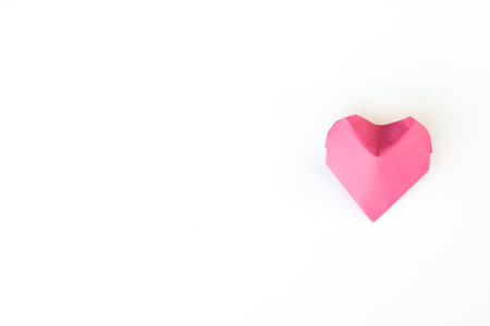 Valentines day concept, red paper hearts on white background with copy-space.の写真素材