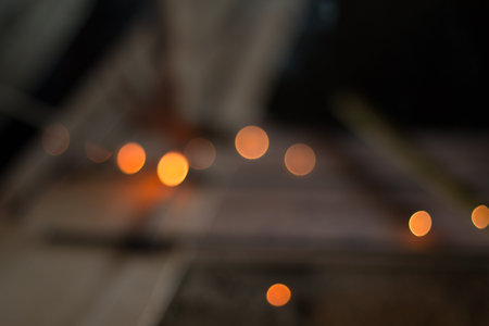 Bokeh light from sparks, labour welding steel in the industry plants. image for background.