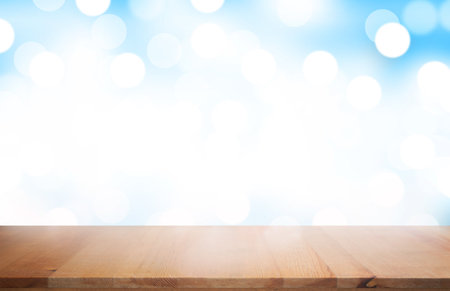 Wooden product display with blue gradient background.の写真素材