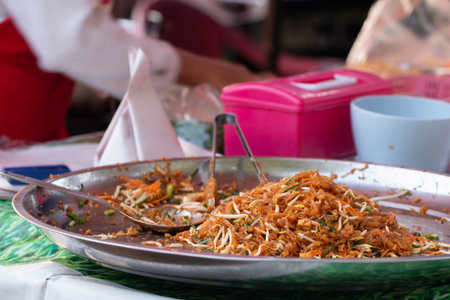 Fried noodle Thai style with prawns in Thailand's market street food.の写真素材