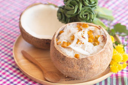 GLUTINOUS RICE ROASTED IN COCONUT or Sticky rice soaked in coconut milk.の写真素材