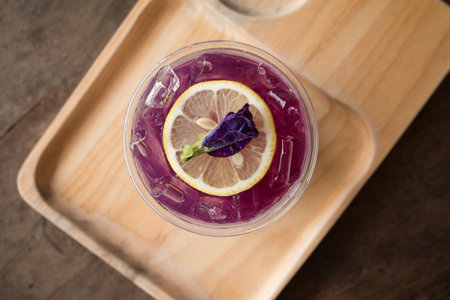 Iced Butterfly Pea Juice with Honey and Lime, Summer healthy drink.