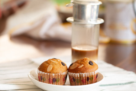 Homemade Banana cupcake with chocolate and cashew nut.の写真素材