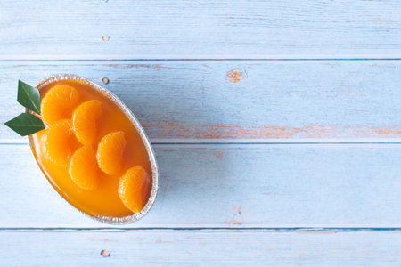 Homemade orange cake on wooden vintage table background.の写真素材