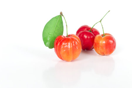Fresh Barbados cherry on white background, Isolated fruit object.の写真素材