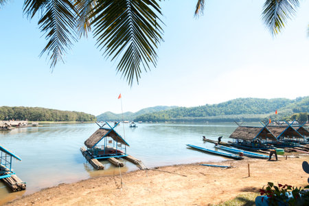 Bamboo raft floating on lake in summer,Travel on Summer in Thailand.の写真素材