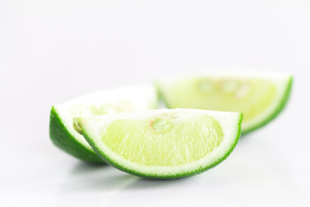 Fresh lime on white background isolated image.