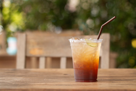Ice tea with lemon and honey summer drink.の写真素材
