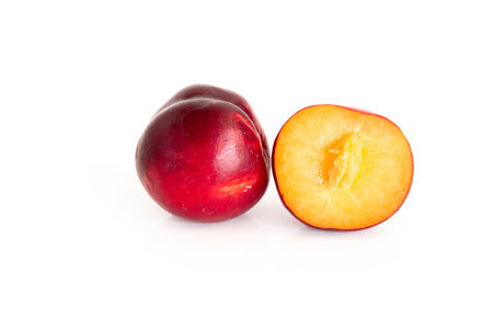 Isolated of Fresh red cherry plum on white background.の写真素材