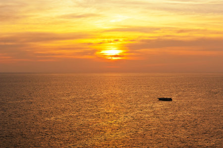 Tour boat and Sunsetの写真素材