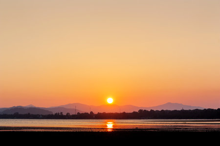 Sunset at the beach twilight time summer seasonの写真素材