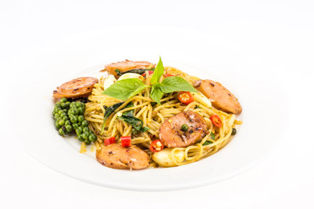 Spaghetti with pepper isolate on white backgroundの写真素材