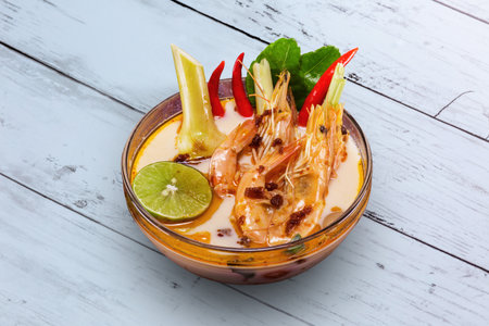 Shrimp soup Thai food on wooden tableの写真素材