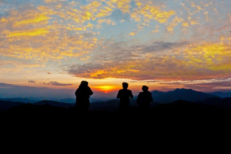 Tourist with sunrise on mountain national park in Thailand Asiaの写真素材