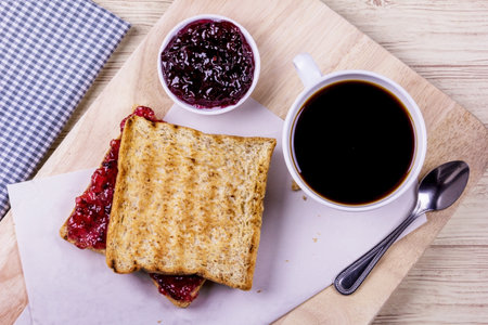 Bread with mixed berry on wooden tableの写真素材