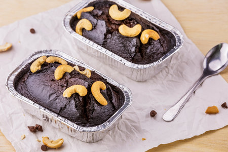 Brownie cake dessert with nut on wooden tableの写真素材