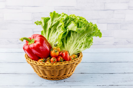 Vegetable tomato and bell pepper on wooden backgroundの写真素材