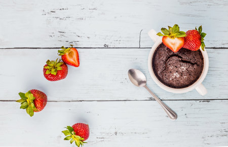 Brownie with strawberry fruit on wooden background