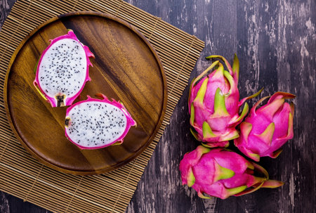 Dragon fruit from Thailand Asia on dark wooden backgroundの写真素材