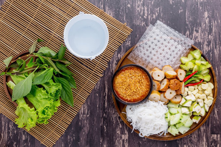 Vietnamese meatball wraps tasty food on dark wooden tableの写真素材