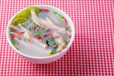 Chicken feet spicy soup tasty Thai street foodの写真素材