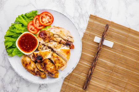 Roast chicken favorite food on marble tableの写真素材