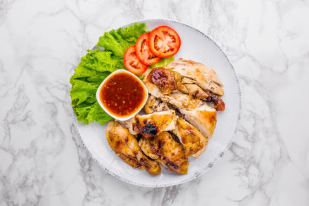 Roast chicken favorite food on marble backgroundの写真素材