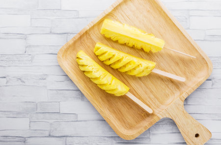 Pineapple fresh fruit on wooden backgroundの写真素材