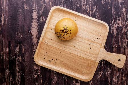 Red bean bread favorite bakery on dark wooden background