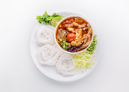 Rice vermicelli northern Thai with chicken and pok on white table background