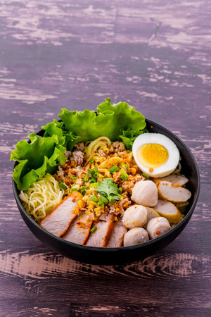 Dry noodles, red pork and meatballs