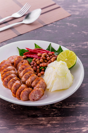 Thai sausage favorite street food on dark wooden table backgroundの写真素材