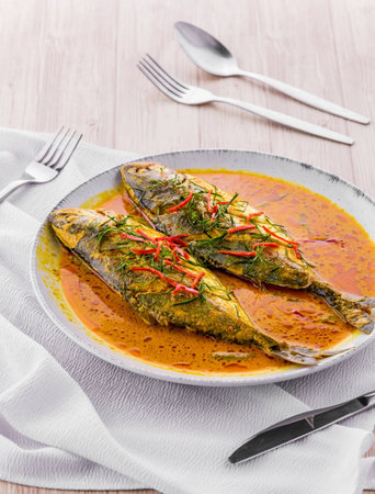 Fish in red curry fried favorite Thai foodの写真素材