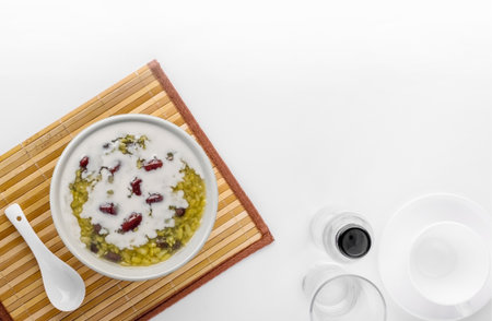 Sweet mung bean porridge with coconut milk recipe on white background