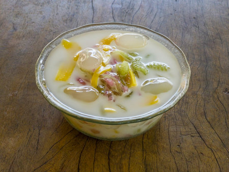 Ruam mit favorite Thai dessert on old wooden backgroundの写真素材