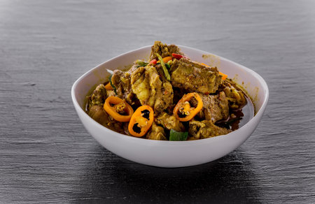 Curry pork bones on dark backgroundの写真素材