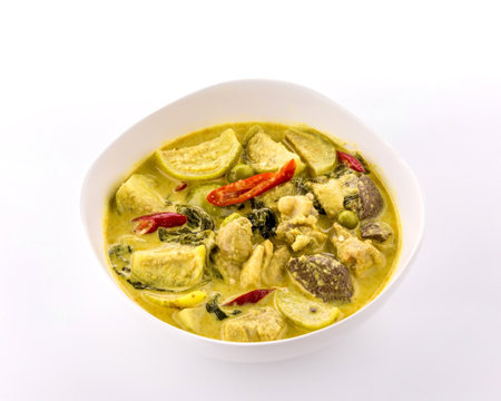 Thai favorite food chicken green curry on white backgroundの写真素材